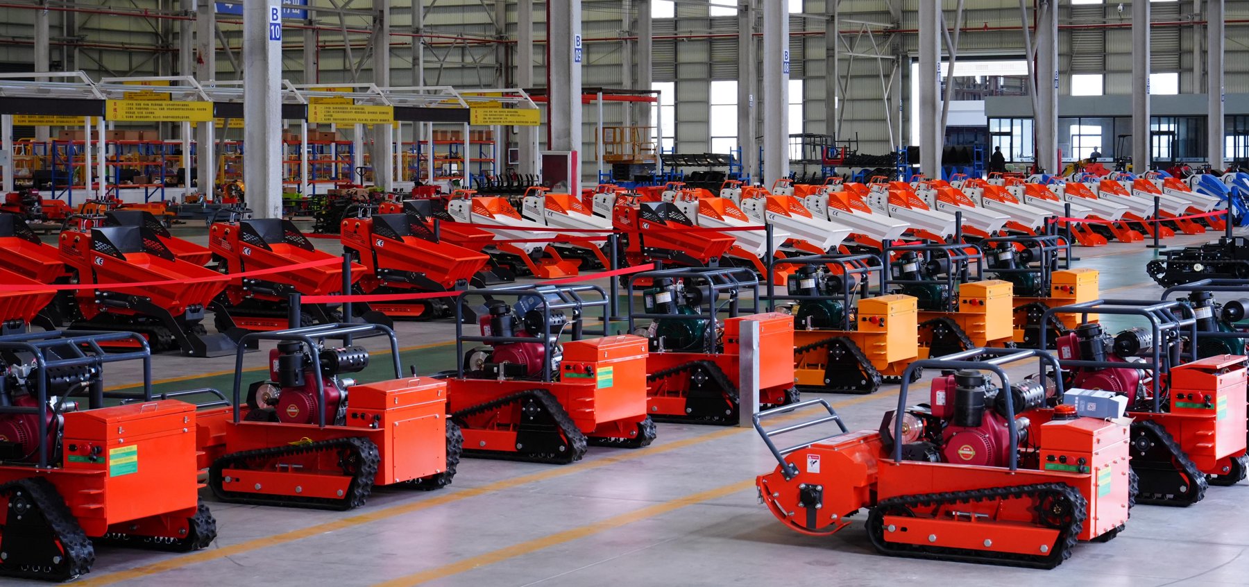 Rows of JEVOK remote control mowers ready for shipment
