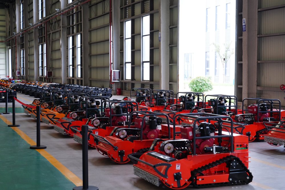 Rows of JEVOK remote control mowers ready for shipment